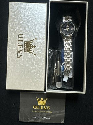 OLEVS Women’s Watch Black Face, Gold/Silver Band, Day Date, Quartz