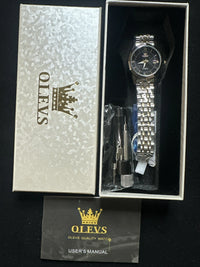 OLEVS Women’s Watch Black Face, Gold/Silver Band, Day Date, Quartz