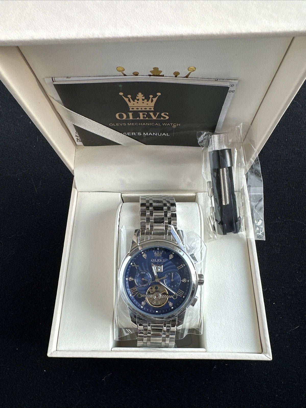 Olevs Men’s Watch Skeleton 5 Hands Silver Band, Blue Dial, Gold Bezel