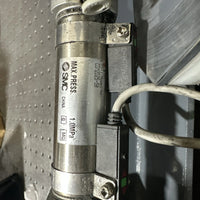 SMC CDM2D25-50 pneumatic cylinder with a D-H7A1 proximity auto-switch